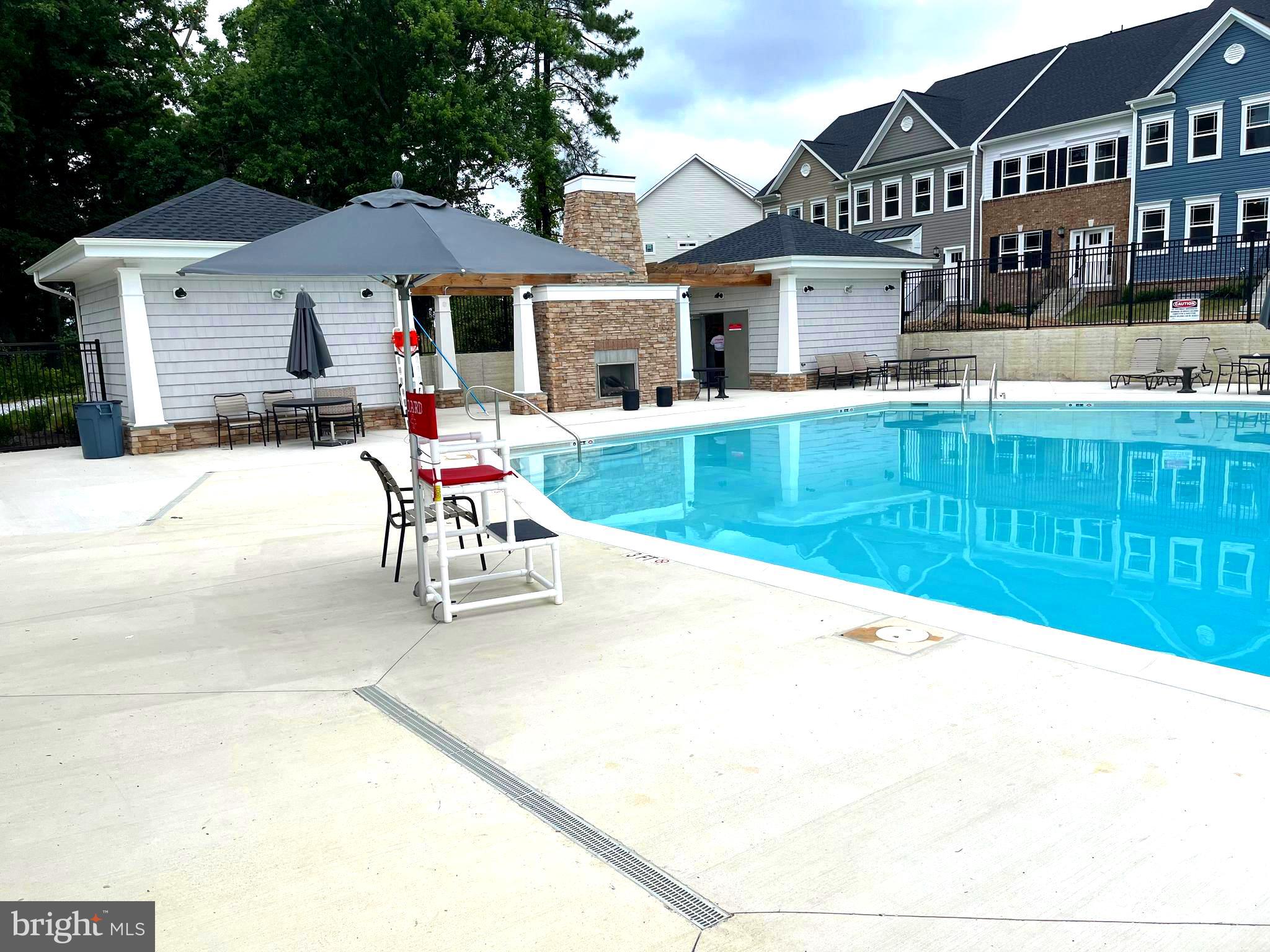 7618 Johnnycake Road Windsor Mill, MD 21244 - Photo 41 of 45 a house view with a seating space and a garden