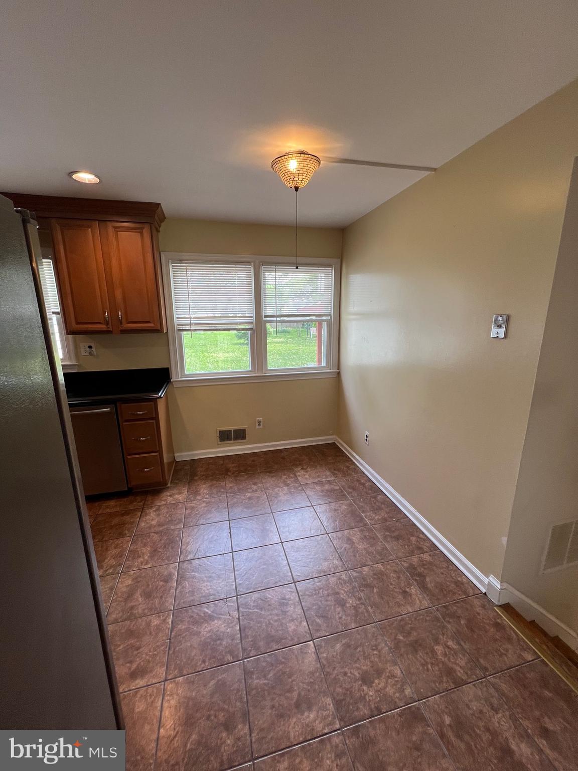 6825 Ridgeway Drive Springfield, VA 22150 - Photo 17 of 33 a view of an empty room with a window