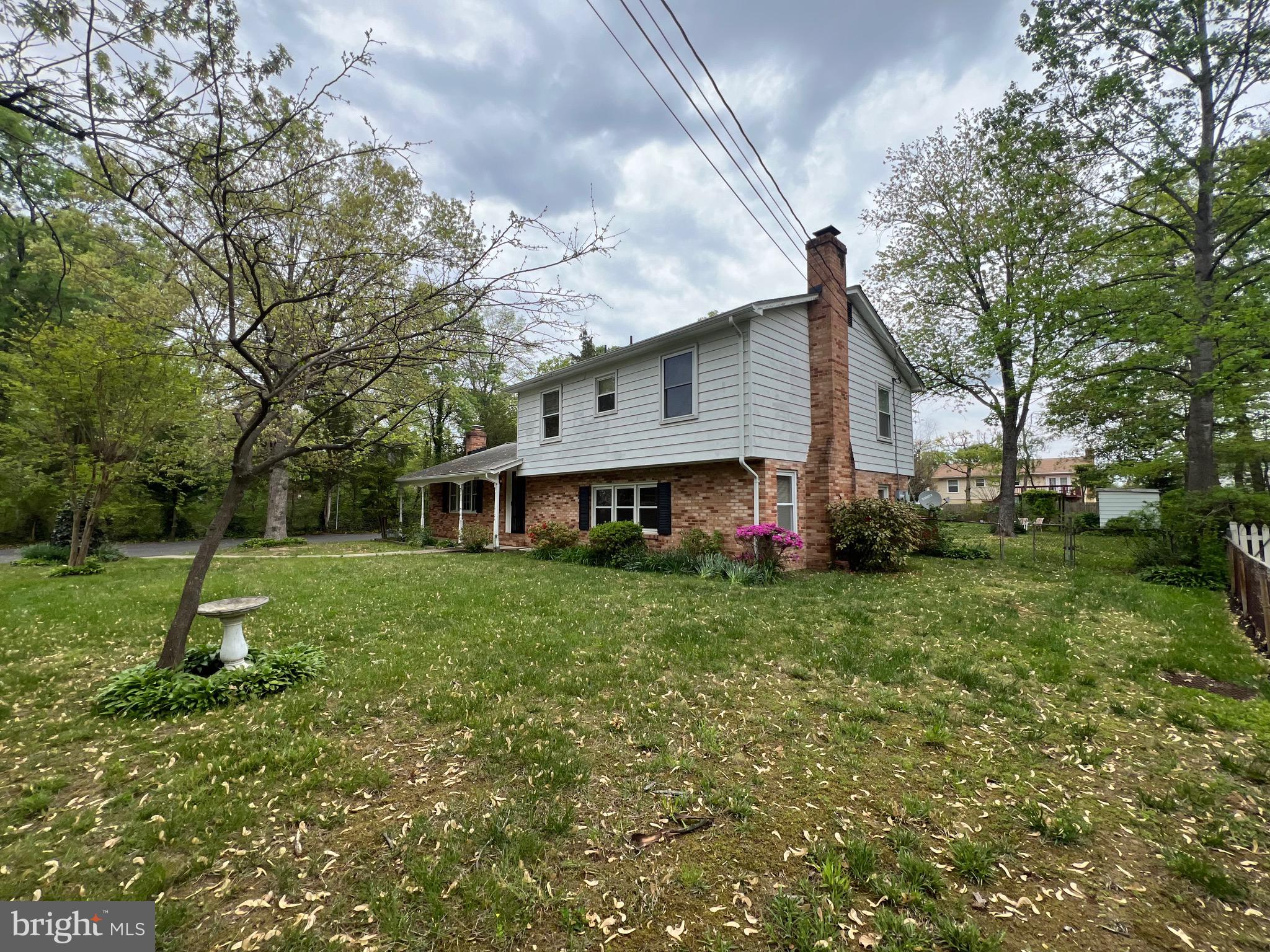 6825 Ridgeway Drive Springfield, VA 22150 - Photo 3 of 33 a view of a house with a backyard