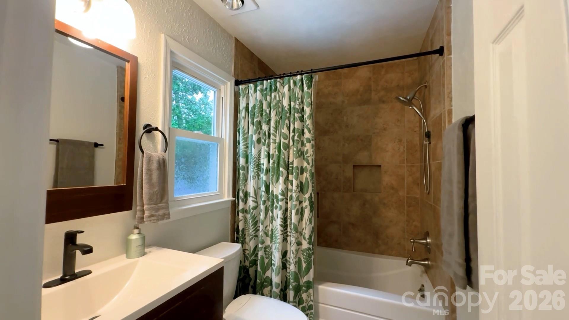 824 Riverwood Road Charlotte, NC 28270 - Photo 13 of 37 a bathroom with a sink toilet and shower