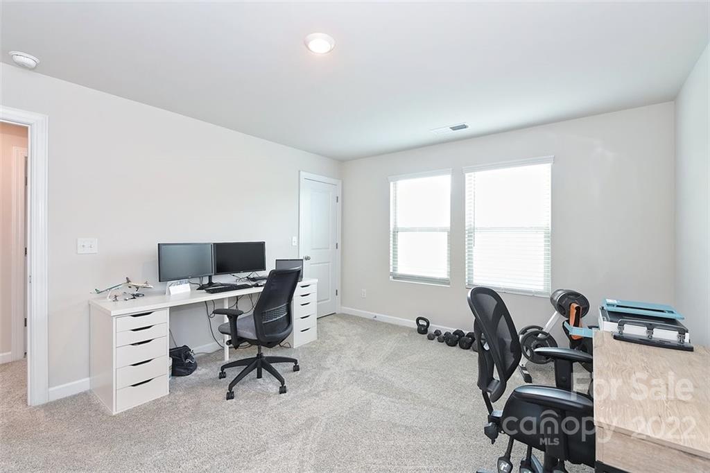 3838 Isenhour Road Kannapolis, NC 28081 - Photo 13 of 17 a view of a workspace with furniture and a window