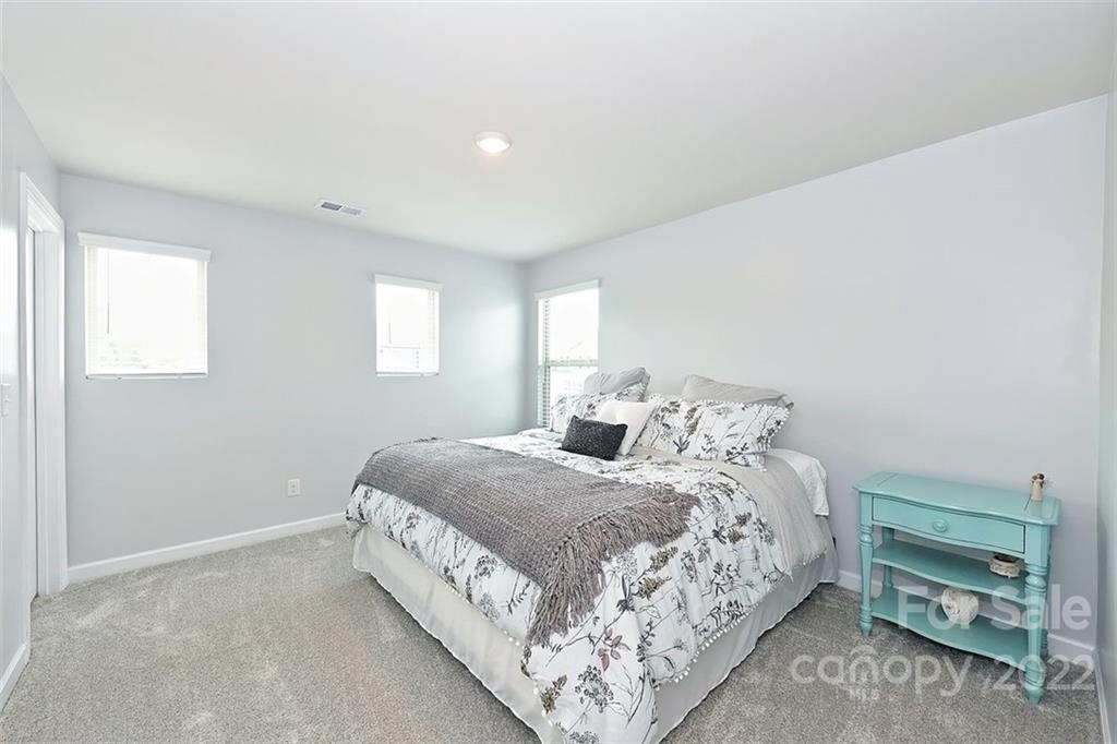 3838 Isenhour Road Kannapolis, NC 28081 - Photo 16 of 17 a bedroom with a bed and a window