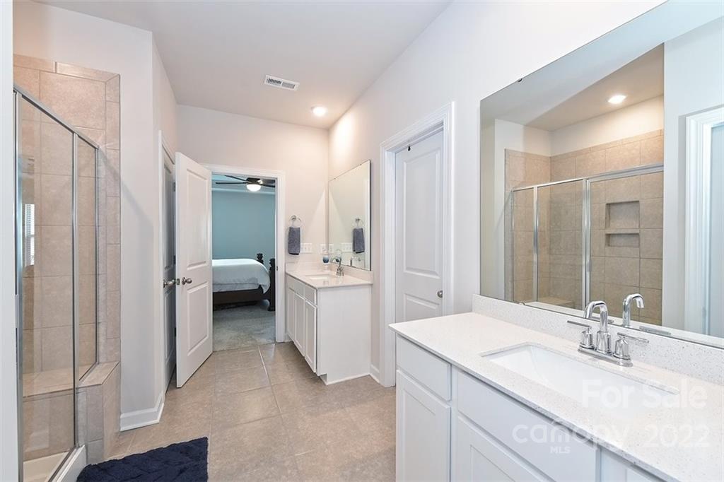 3838 Isenhour Road Kannapolis, NC 28081 - Photo 10 of 17 a bathroom with a sink a toilet and shower