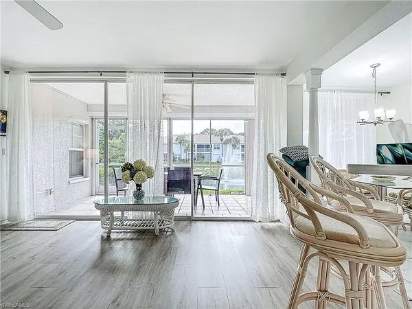 a room with furniture and wooden floor