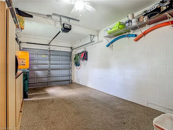 a view of a garage with storage
