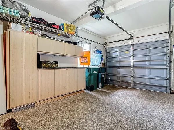 a view of a patio with a table chairs and a table