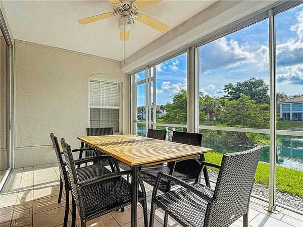 a view of an outdoor dining space with furniture