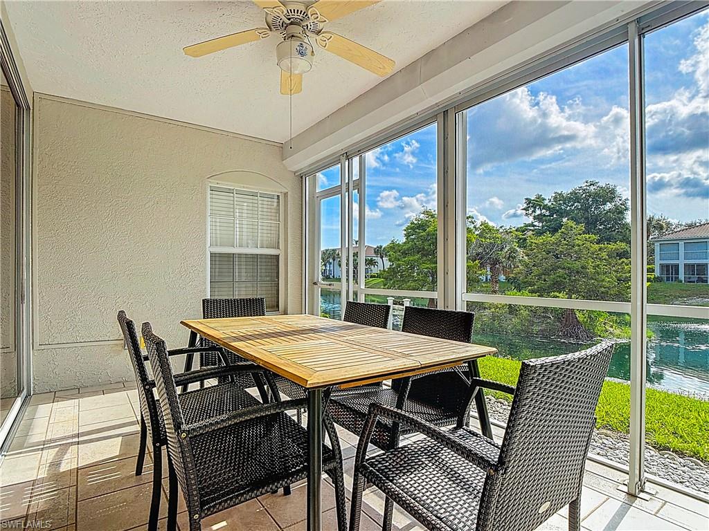 6834 Lantana Bridge Road, Unit 102 Naples, FL 34109 - Photo 40 of 45 a view of a dining room with furniture window and outside view