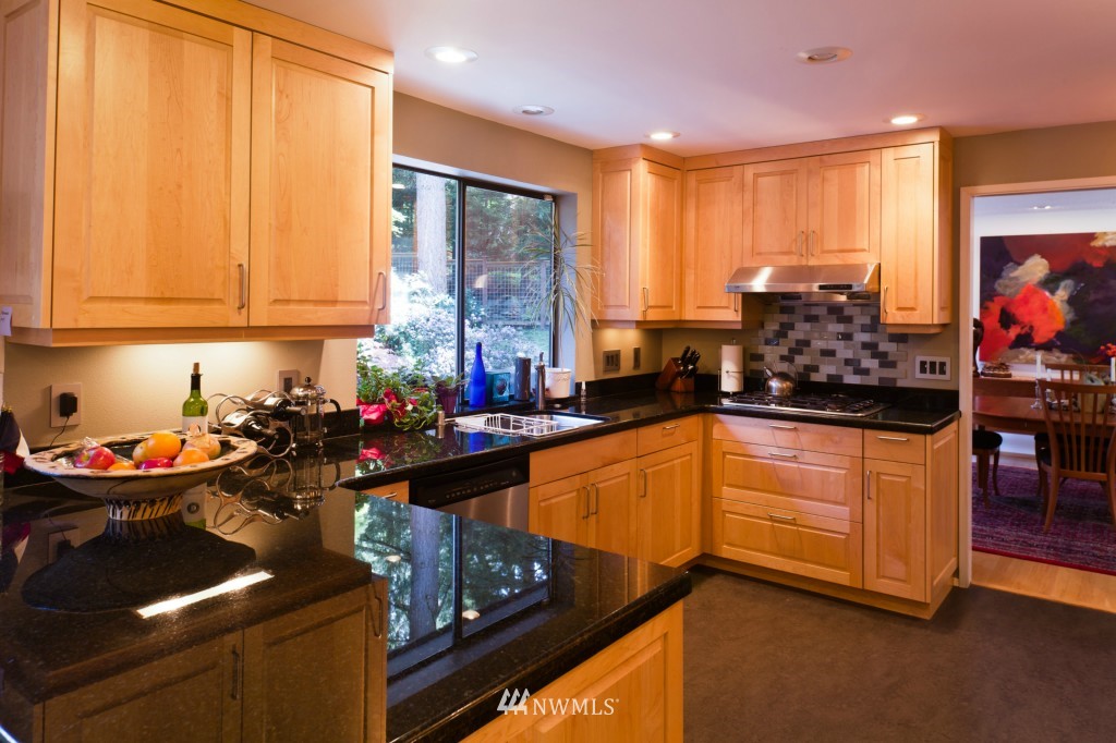 621 Canyon View Road Bellingham, WA 98225 - Photo 6 of 15 a kitchen filled with a large window and a counter top space