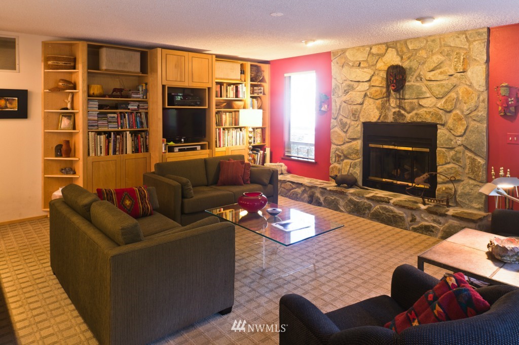 621 Canyon View Road Bellingham, WA 98225 - Photo 8 of 15 a living room with furniture and a fireplace