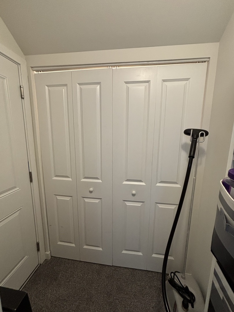 1644 North Hermitage Avenue, Unit 2R Chicago, IL 60622 - Photo 17 of 18 a view of a hallway with stairs