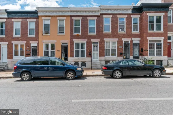 a car parked in front of a building