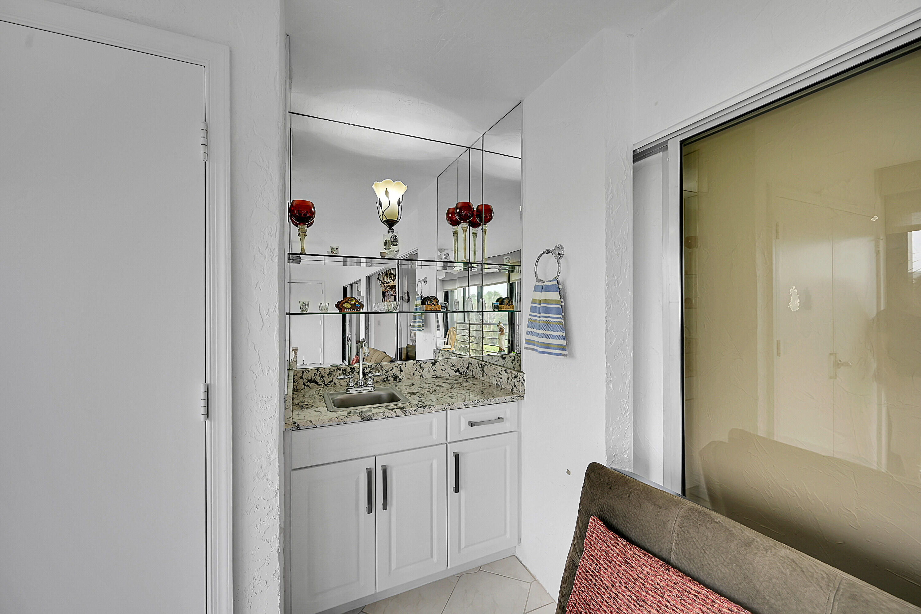 9165 Southwest 14th Street, Unit 1304 Boca Raton, FL 33428 - Photo 27 of 38 Wet Bar On Patio
