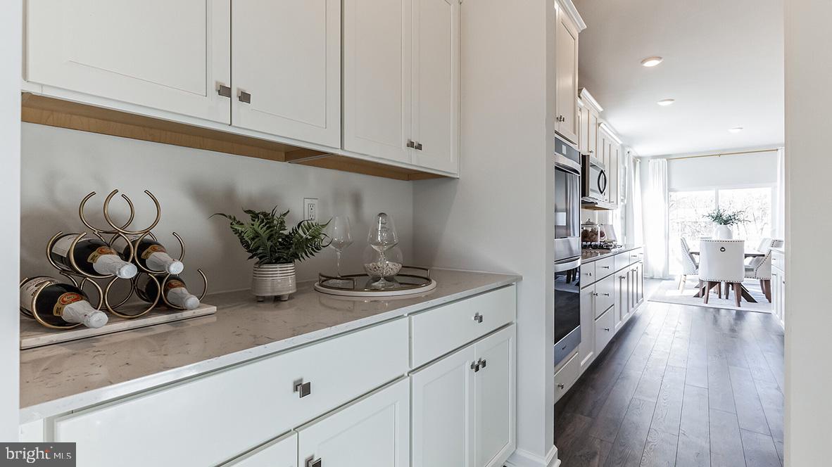 213 Ferrell Road Mullica Hill, NJ 08062 - Photo 8 of 50 a kitchen with sink and cabinets