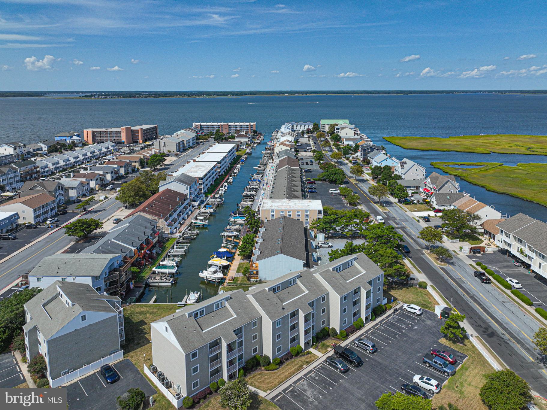9203 Rusty Anchor Road, Unit A5 Ocean City, MD 21842 - Photo 1 of 60 a view of building with an outdoor space