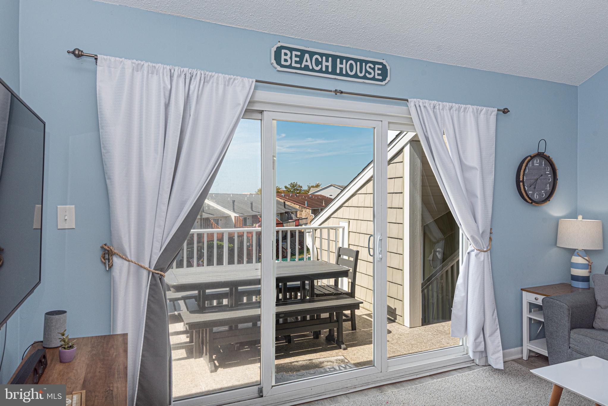 9203 Rusty Anchor Road, Unit A5 Ocean City, MD 21842 - Photo 26 of 60 a view of entryway and hall with wooden floor