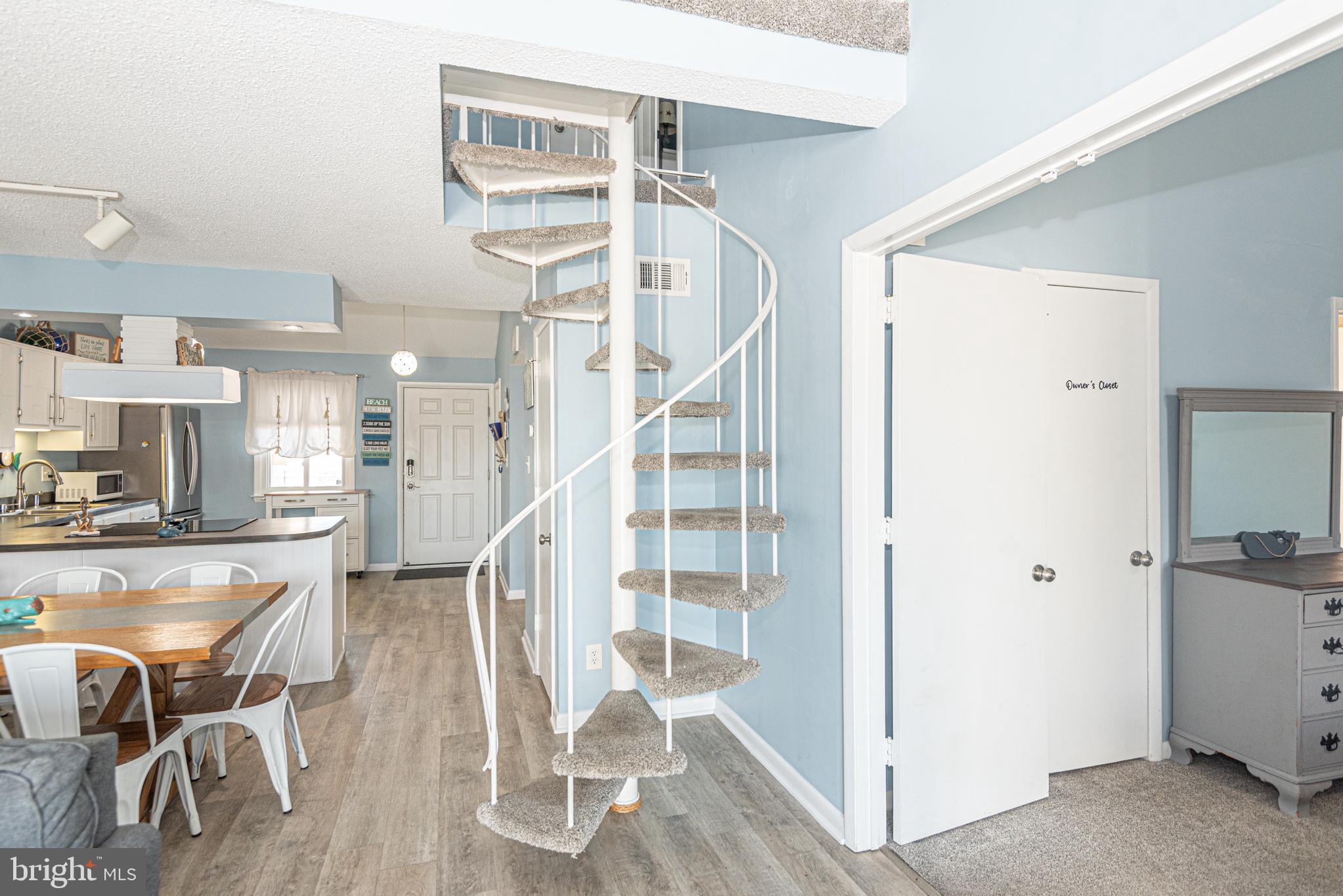 9203 Rusty Anchor Road, Unit A5 Ocean City, MD 21842 - Photo 33 of 60 a view of entryway and livingroom with furniture