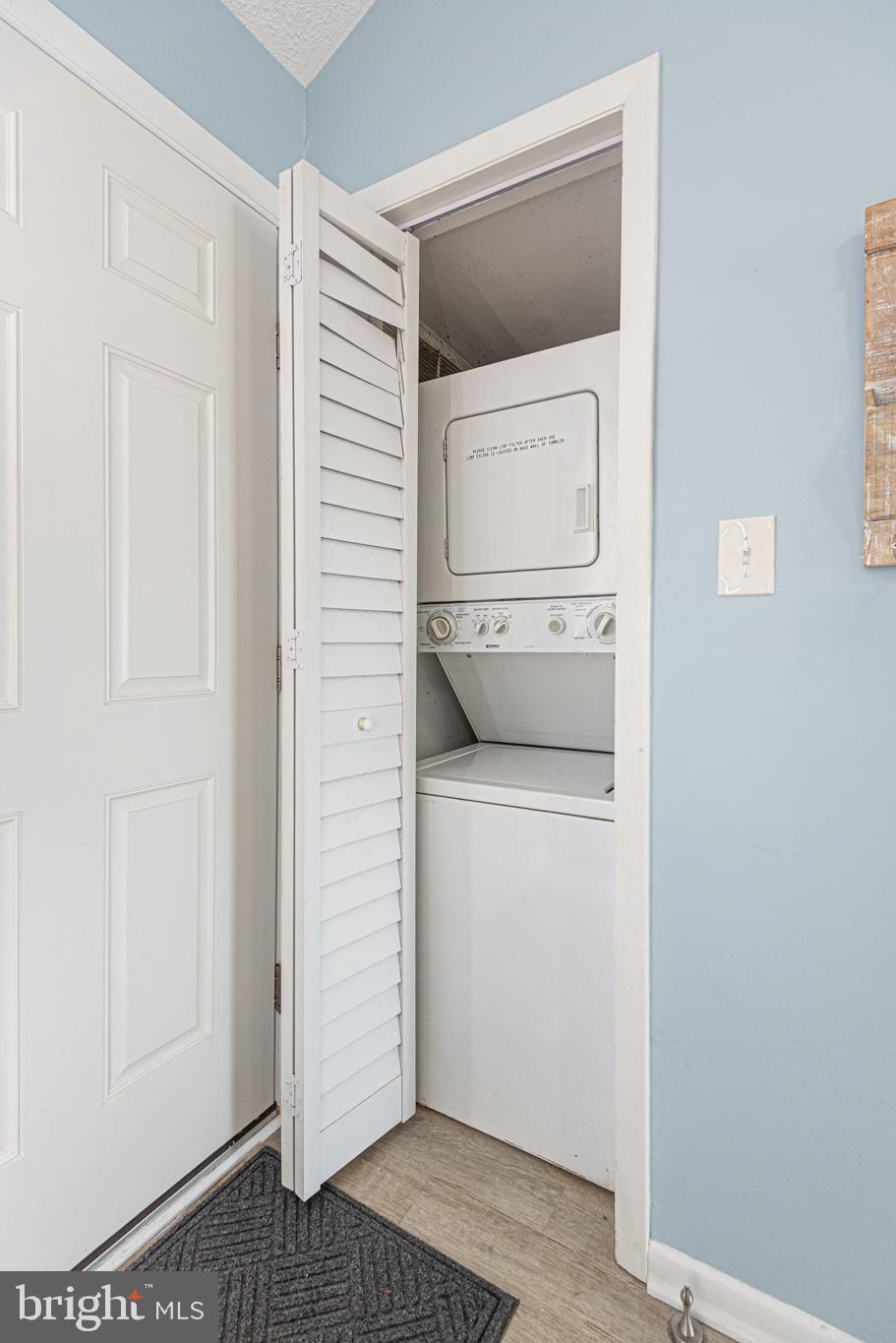 9203 Rusty Anchor Road, Unit A5 Ocean City, MD 21842 - Photo 50 of 60 a utility room with dryer and washer