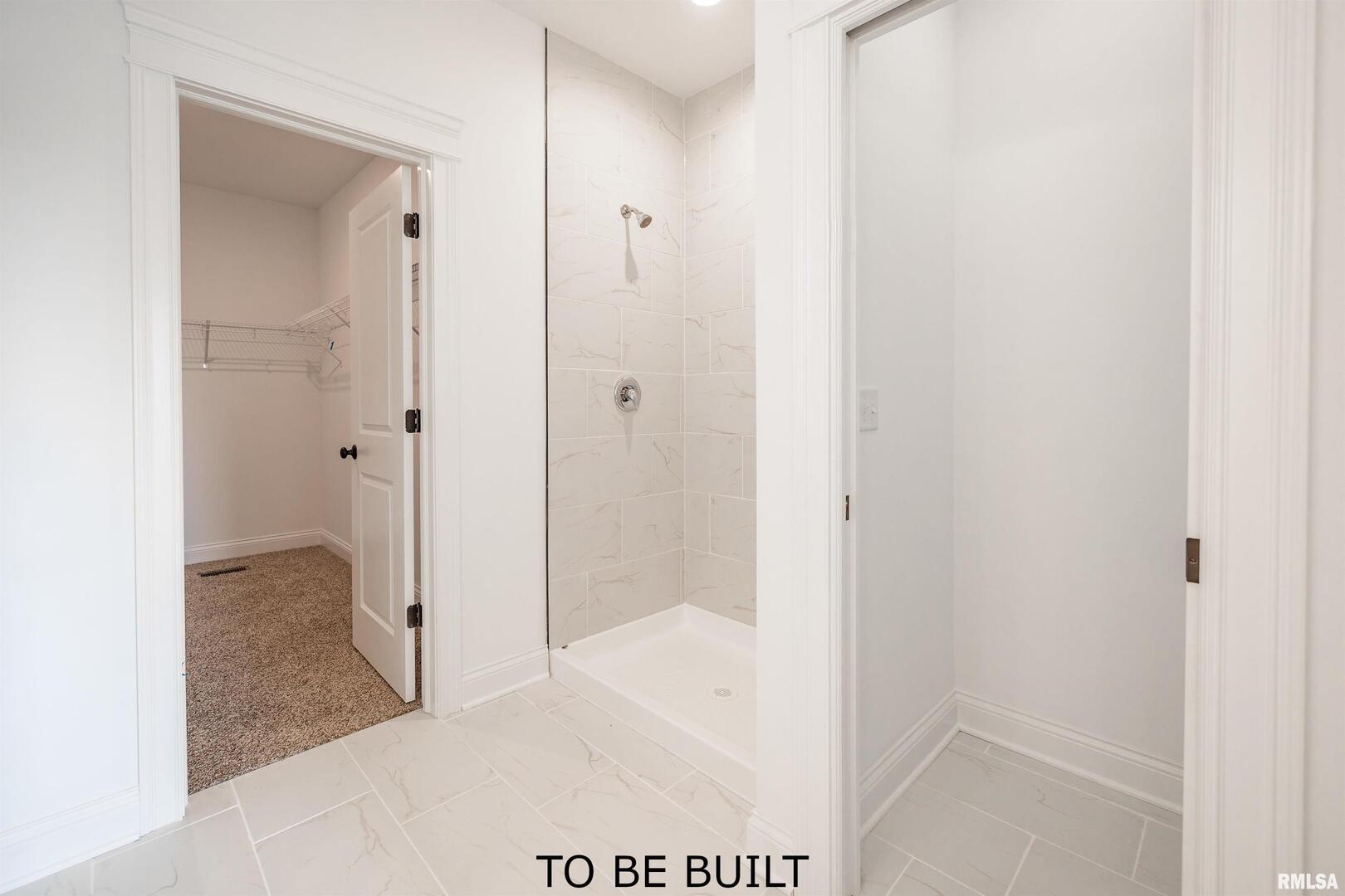 10 South 5th Street Eldridge, IA 52748 - Photo 18 of 29 a bathroom with a shower