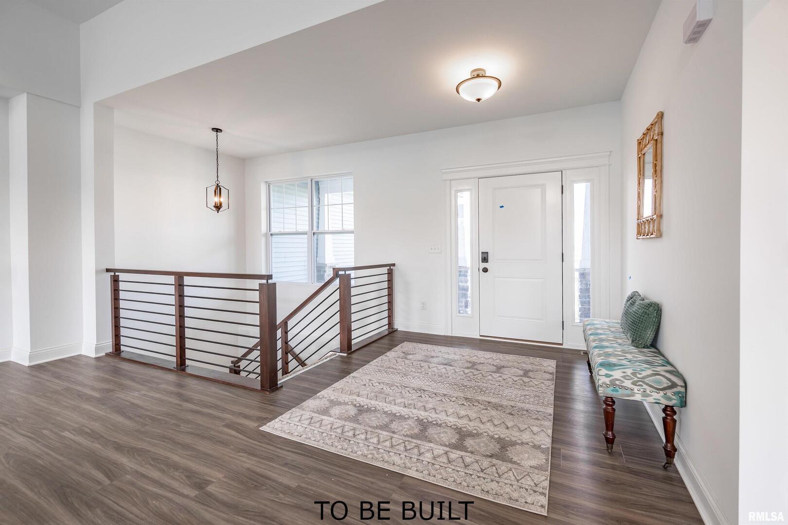 10 South 5th Street Eldridge, IA 52748 - Photo 2 of 29 a view of a livingroom with wooden floor