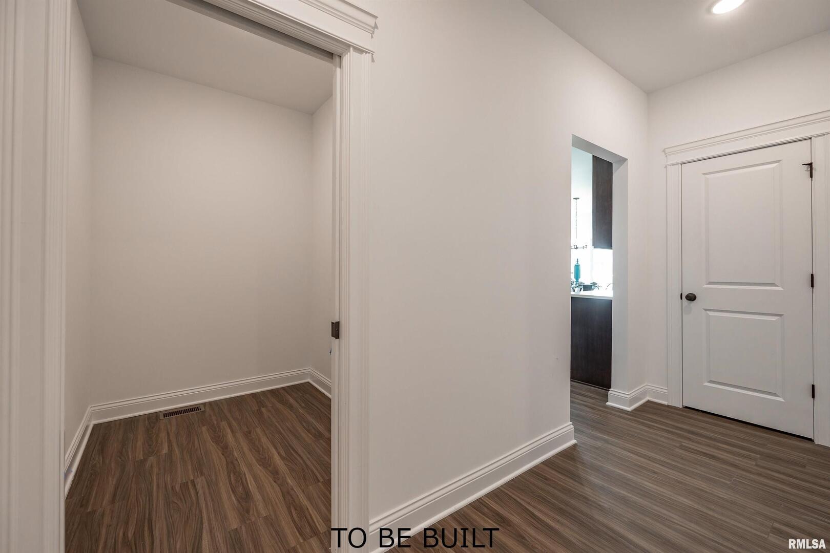 10 South 5th Street Eldridge, IA 52748 - Photo 22 of 29 a view of small space with wooden floor