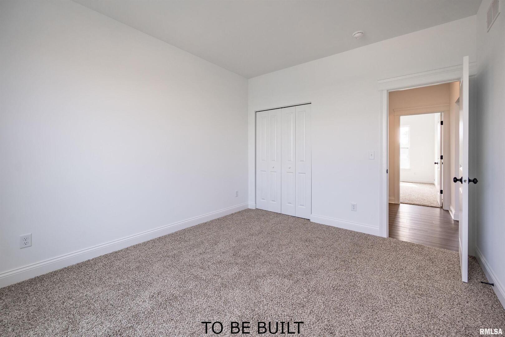 10 South 5th Street Eldridge, IA 52748 - Photo 23 of 29 wooden floor in an empty room
