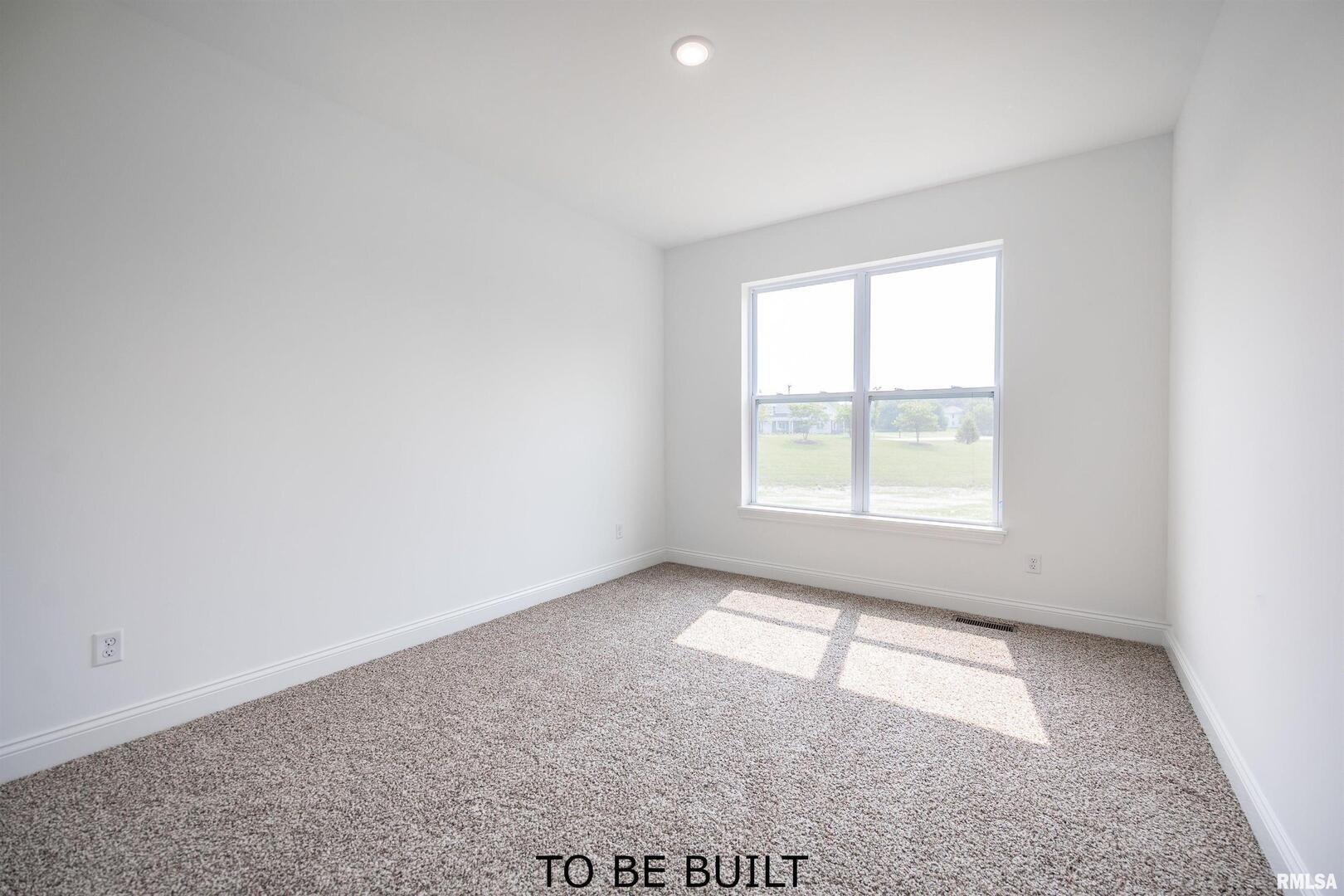 10 South 5th Street Eldridge, IA 52748 - Photo 25 of 29 an empty room with windows