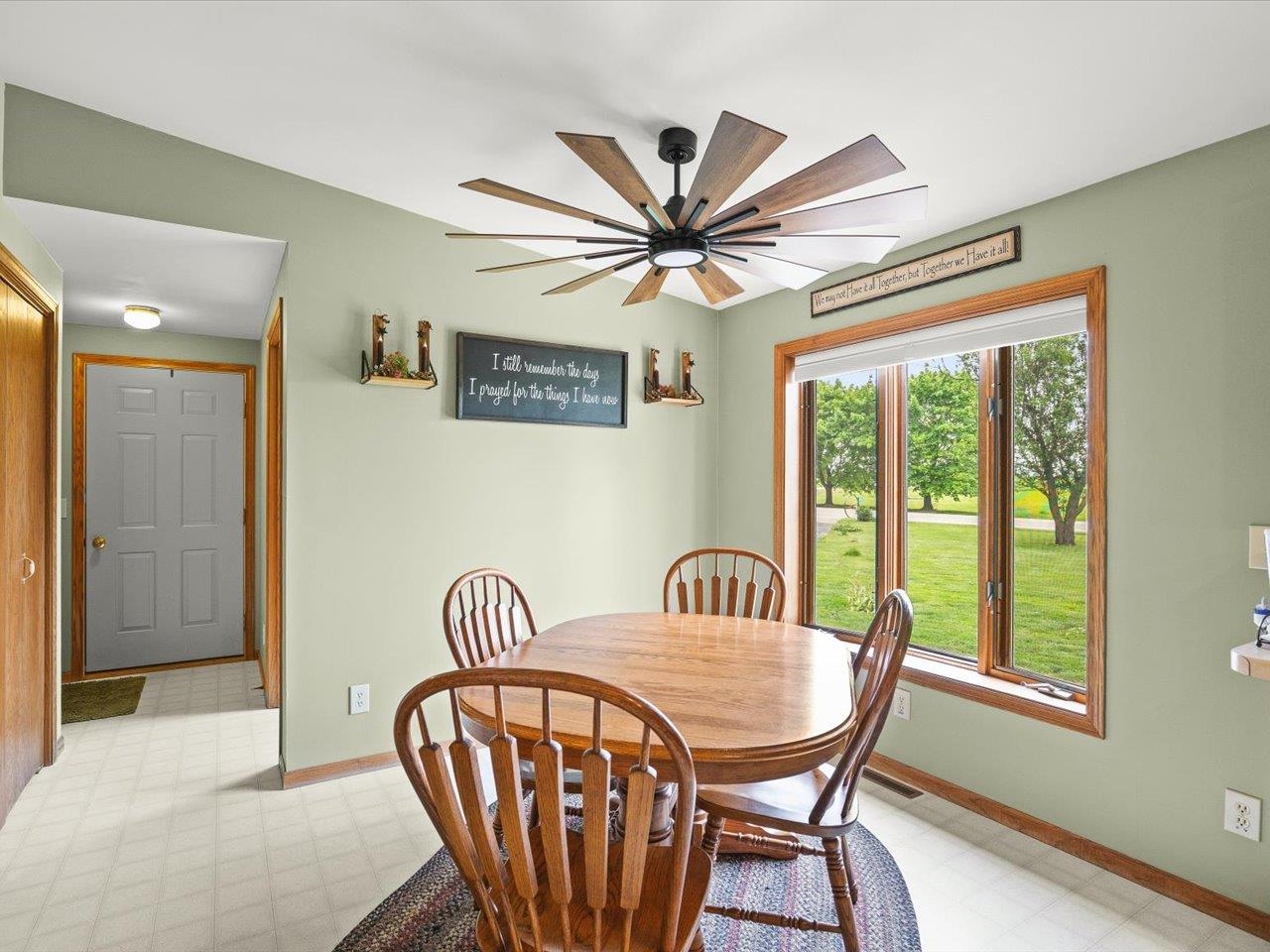 8500 Manchester Road Capron, IL 61012 - Photo 19 of 51 a view of a dining room with furniture window and wooden floor