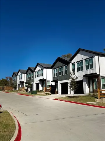 a front view of a building with a street