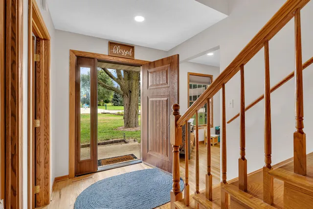 a livingroom with furniture water view and large windows