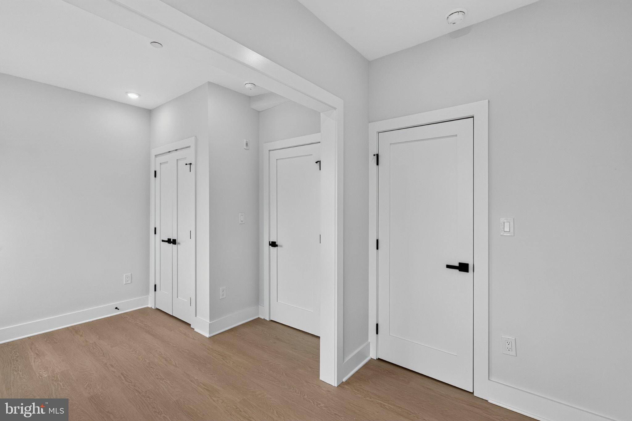 1650 Columbia Road Northwest, Unit 401 Washington, DC 20009 - Photo 14 of 21 Modern entryway with sleek doors.