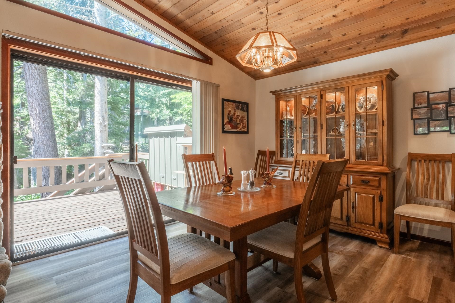 2281 Old Mammoth Road Mammoth Lakes, CA 93546 - Photo 17 of 27 Dining area featuring lofted ceiling, wood finished floors, wooden ceiling, and a chandelier