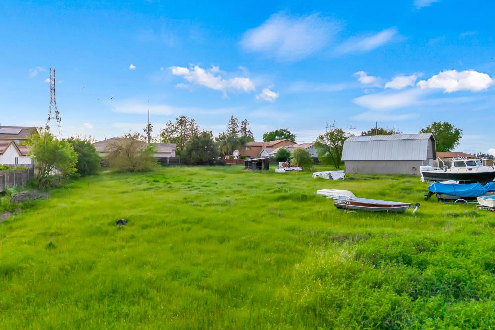 8404 Jordan Ranch Road Elk Grove, CA 95624 - Photo 15 of 19 a view of a golf course with a house