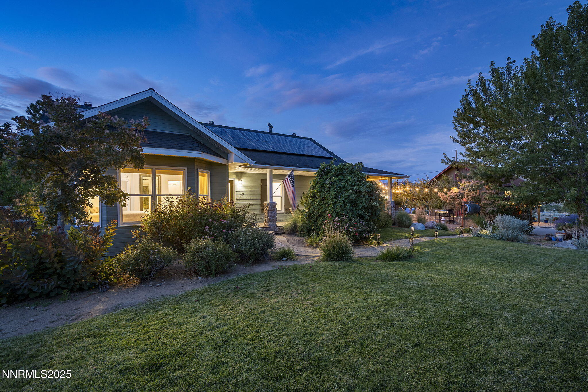 5 Connie Way Reno, NV 89521 - Photo 19 of 54 a view of a house with backyard and garden
