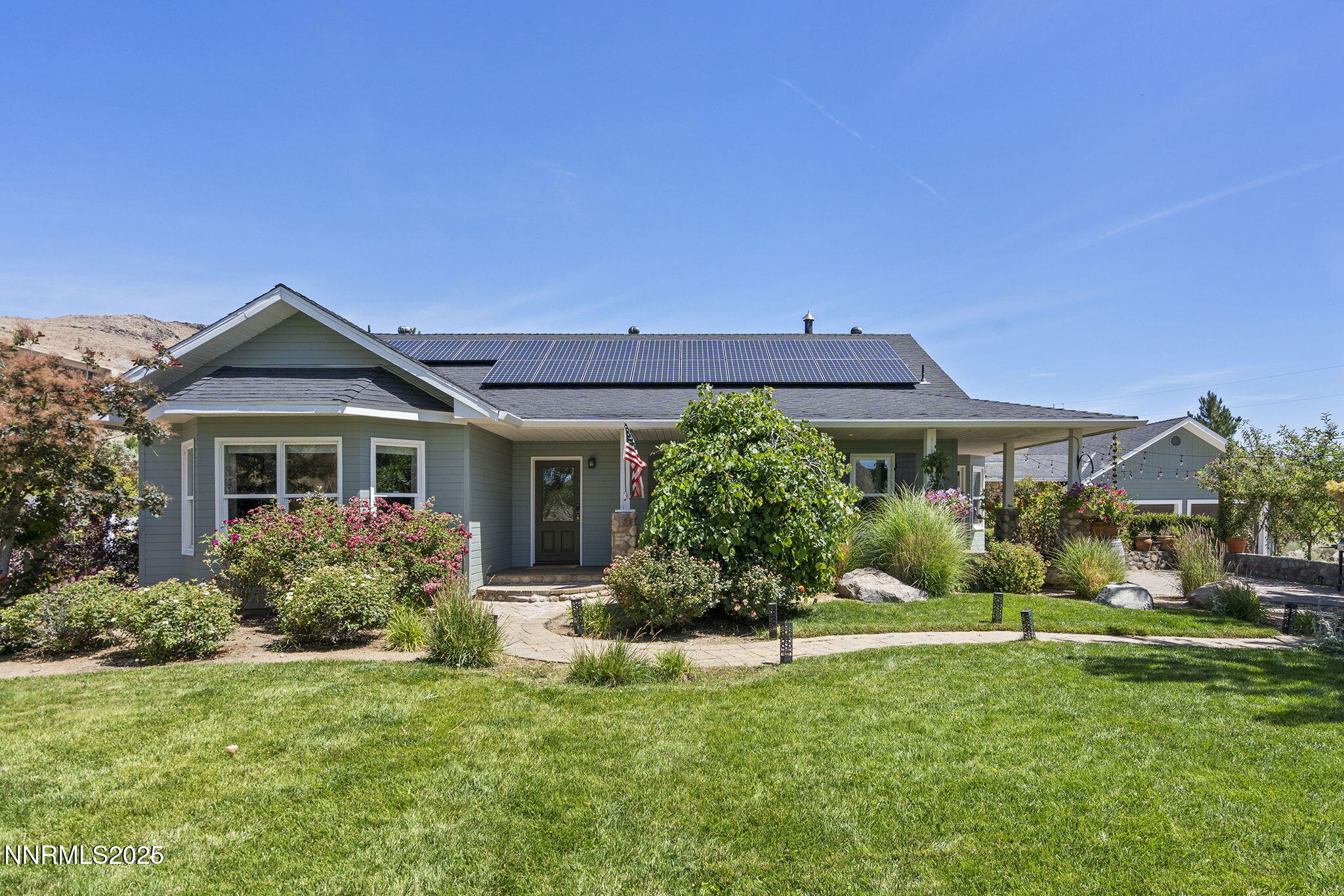 5 Connie Way Reno, NV 89521 - Photo 2 of 54 a front view of a house with a yard