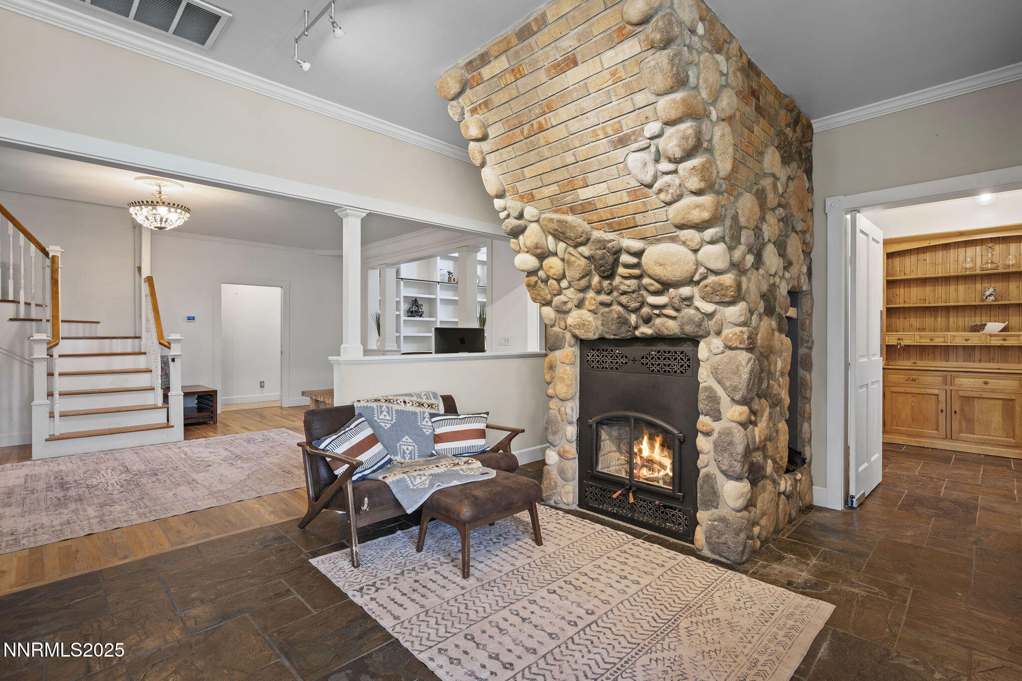 5 Connie Way Reno, NV 89521 - Photo 25 of 54 a living room with furniture and a fireplace