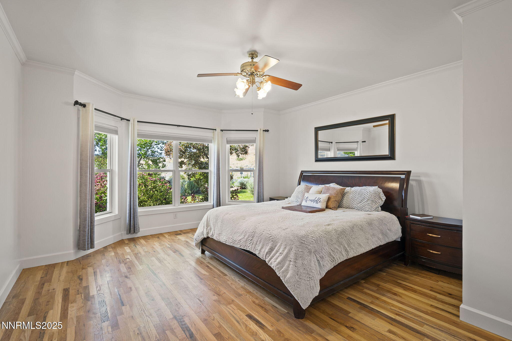 5 Connie Way Reno, NV 89521 - Photo 26 of 54 a bedroom with a large bed and a large window