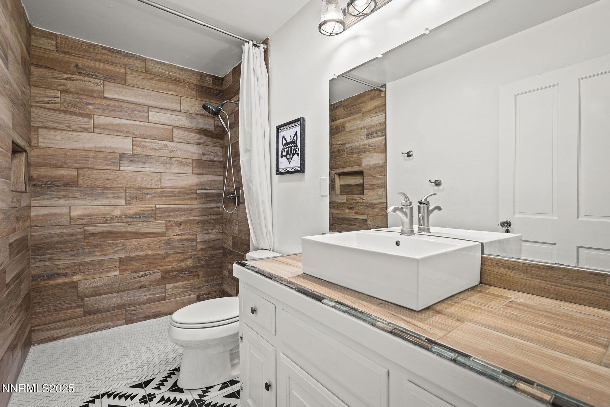 5 Connie Way Reno, NV 89521 - Photo 33 of 54 a bathroom with a sink a toilet and shower