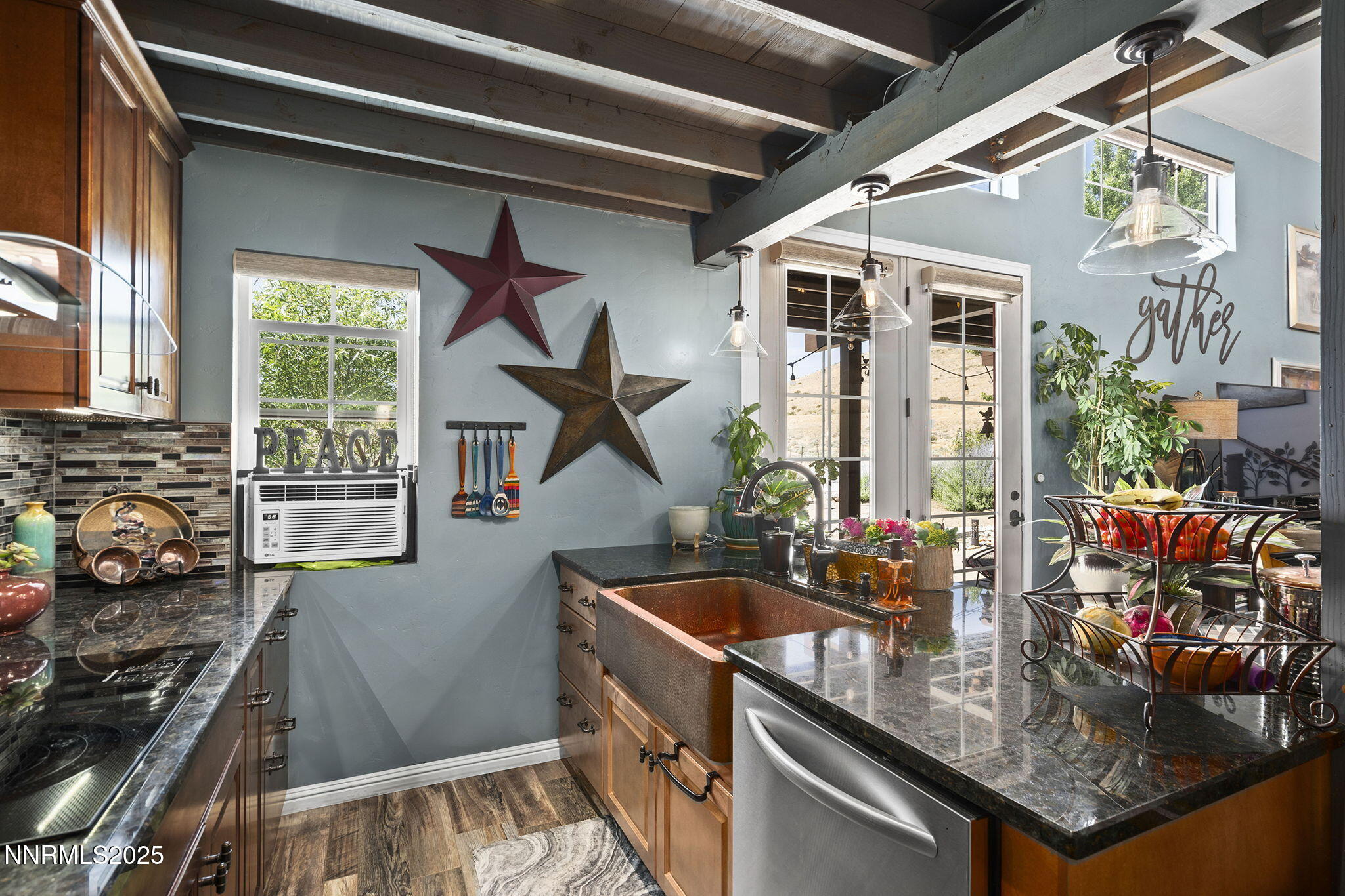 5 Connie Way Reno, NV 89521 - Photo 42 of 54 a kitchen filled with lots of counter space and a window