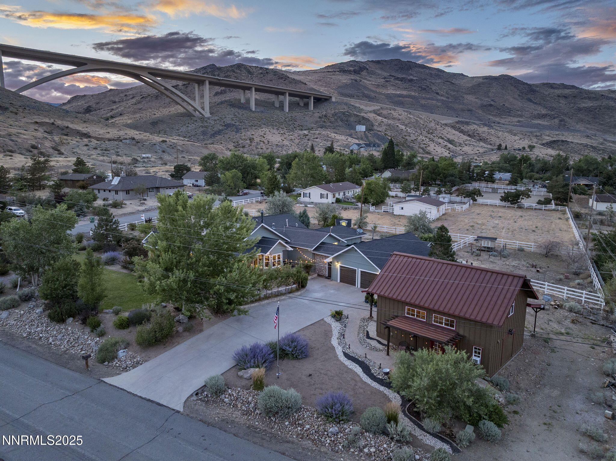 5 Connie Way Reno, NV 89521 - Photo 5 of 54 a view of a house with a yard and mountain view in back