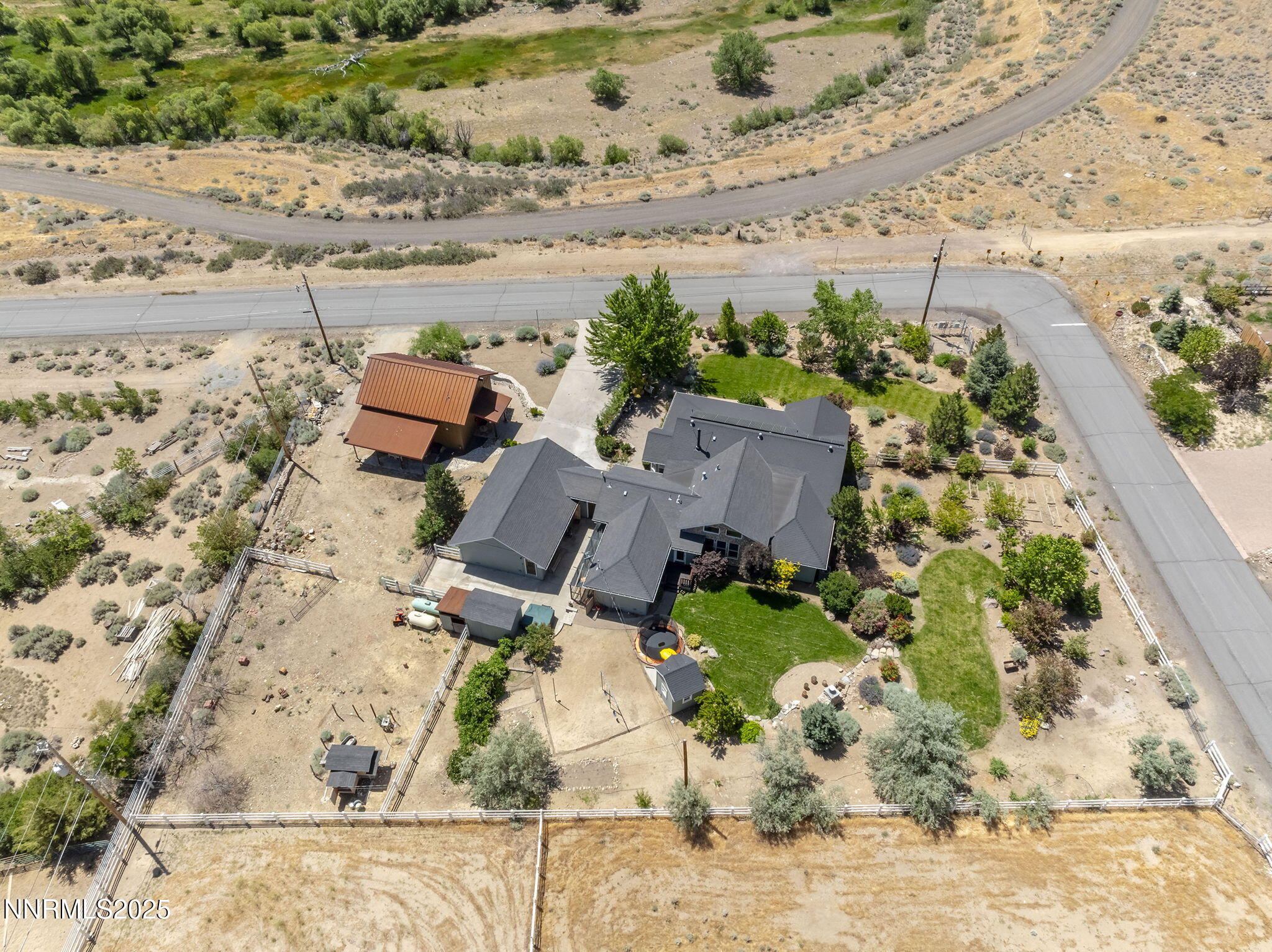5 Connie Way Reno, NV 89521 - Photo 54 of 54 an aerial view of a house with a yard and ocean view