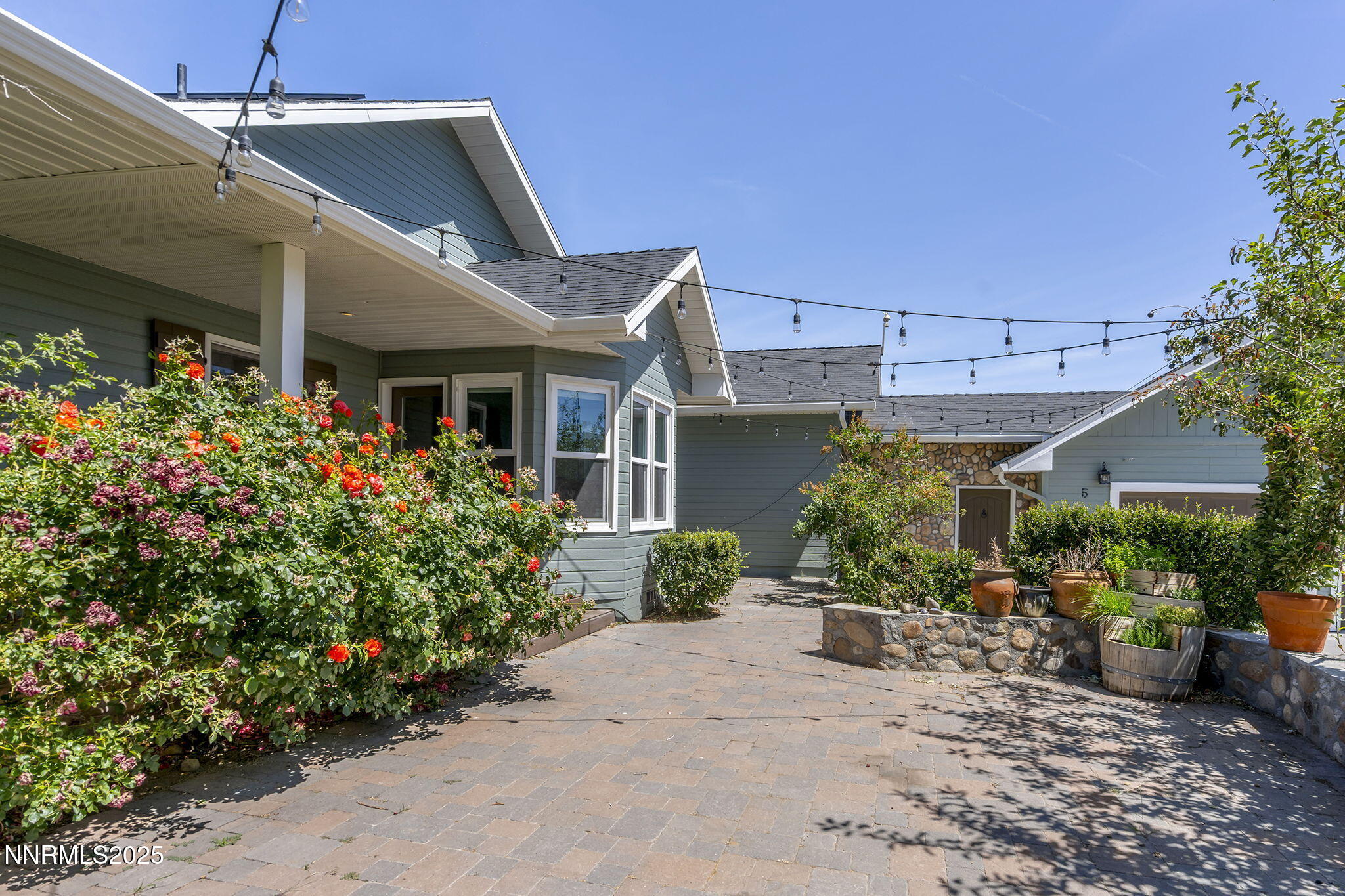 5 Connie Way Reno, NV 89521 - Photo 8 of 54 a front view of a house with plants
