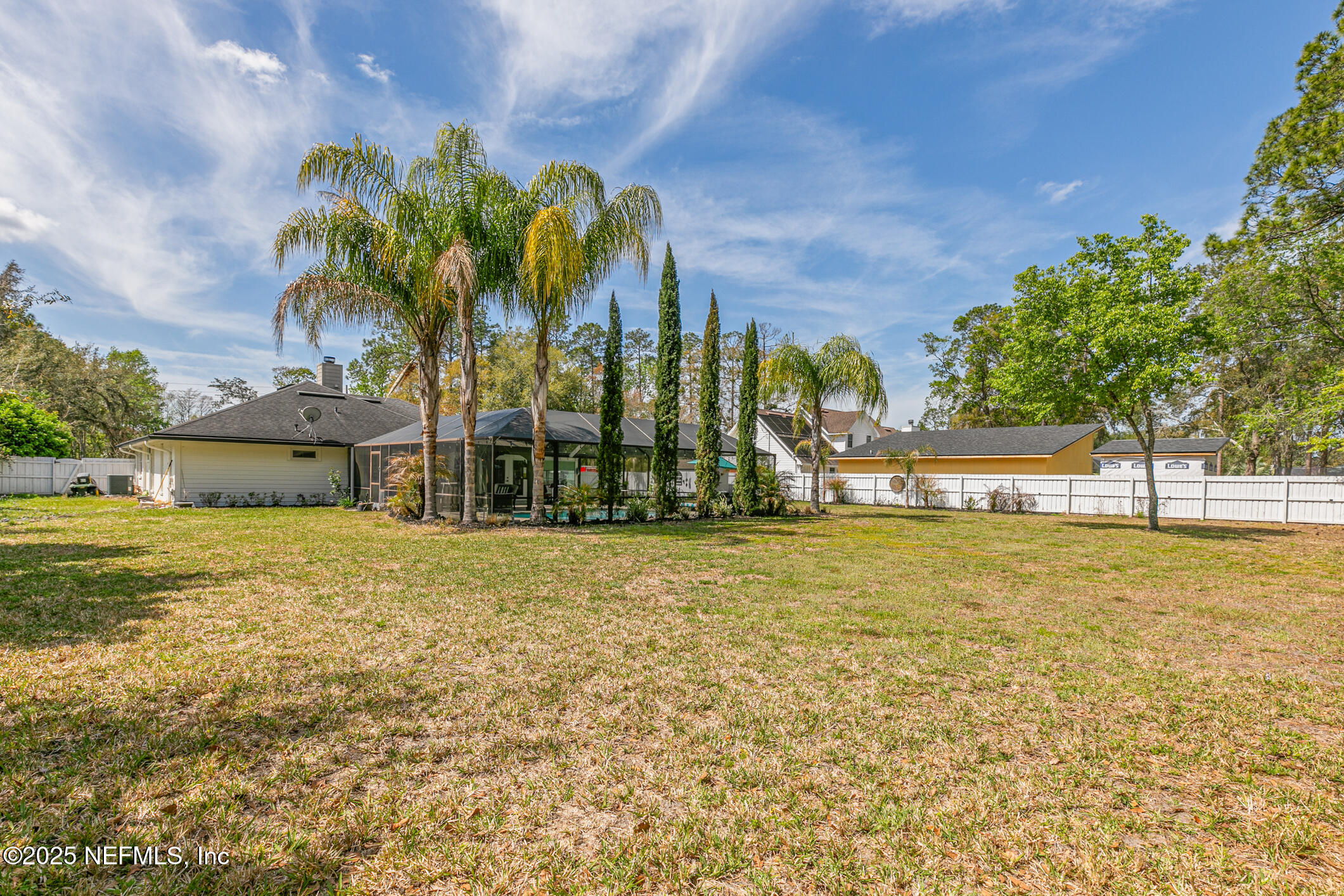 540 Roberts Road St. Johns, FL 32259 - Photo 54 of 62 a view of a street with a building in the background