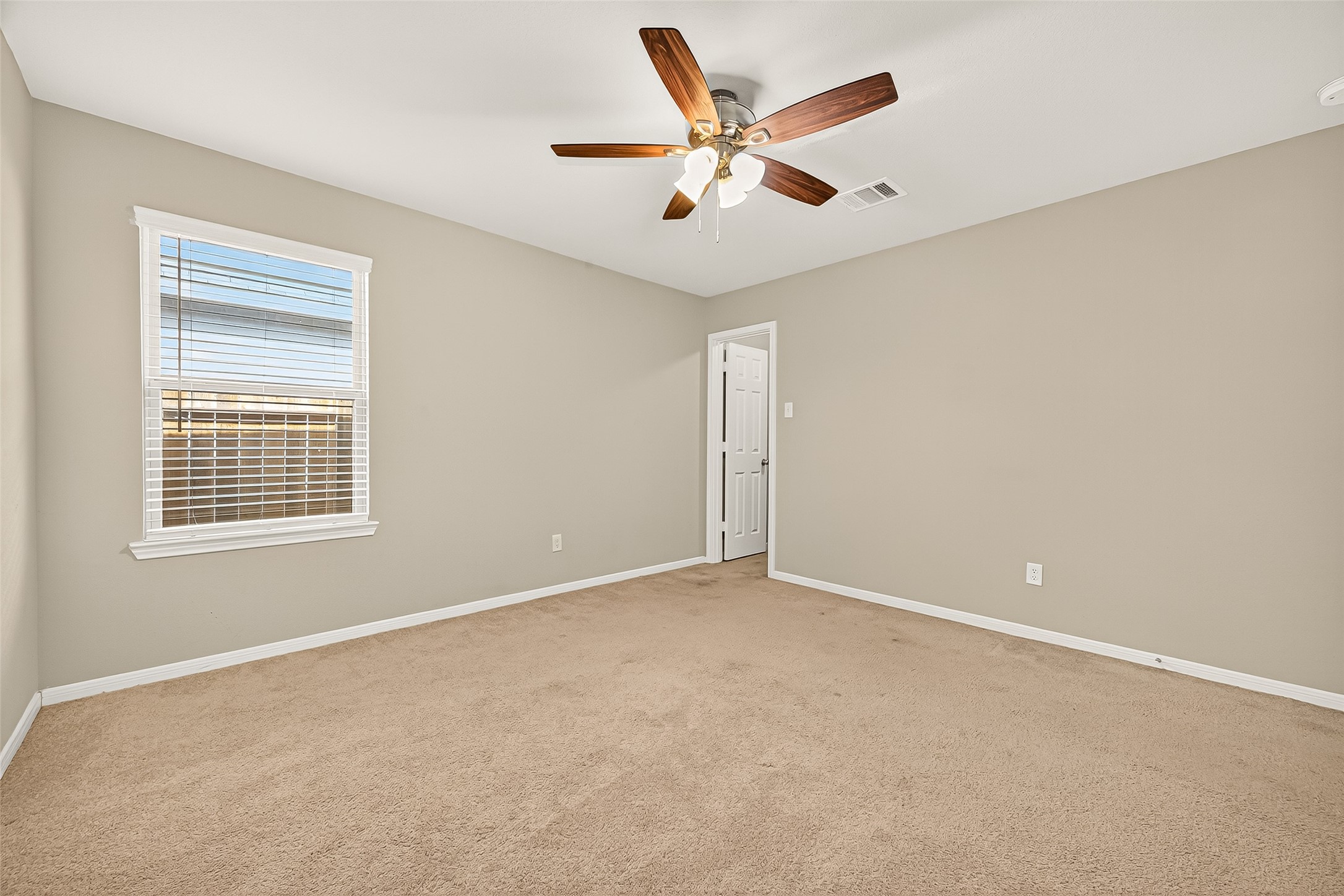 7219 Victorville Drive Rosharon, TX 77583 - Photo 15 of 34 a view of an empty room with a window