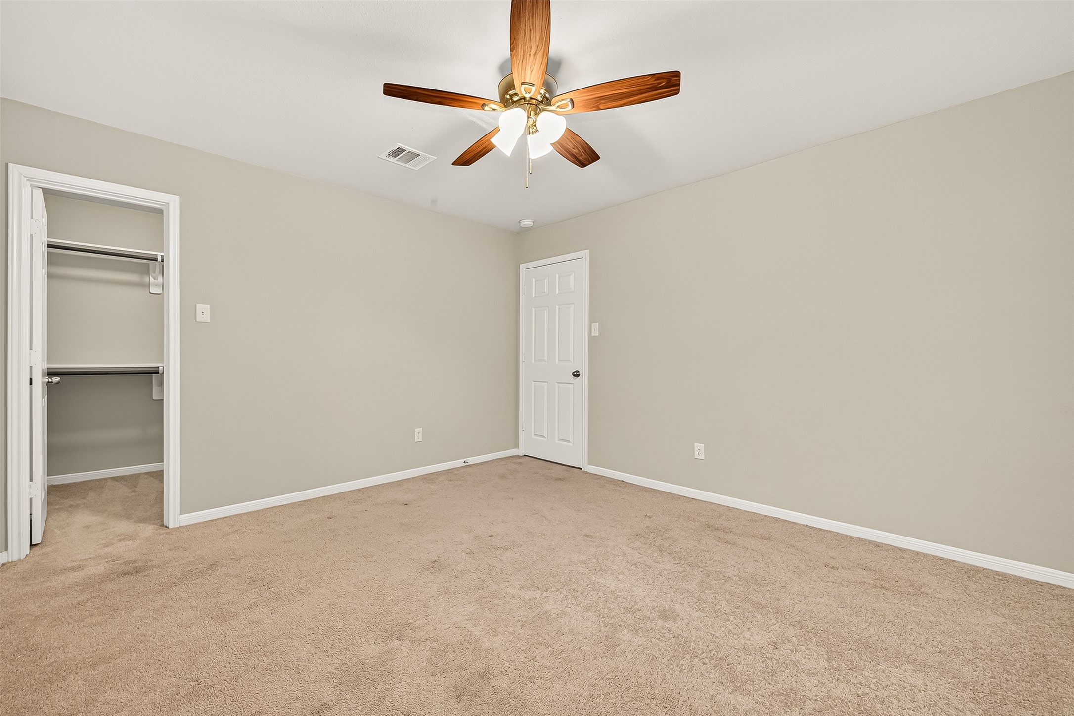 7219 Victorville Drive Rosharon, TX 77583 - Photo 16 of 34 an empty room with windows and fan