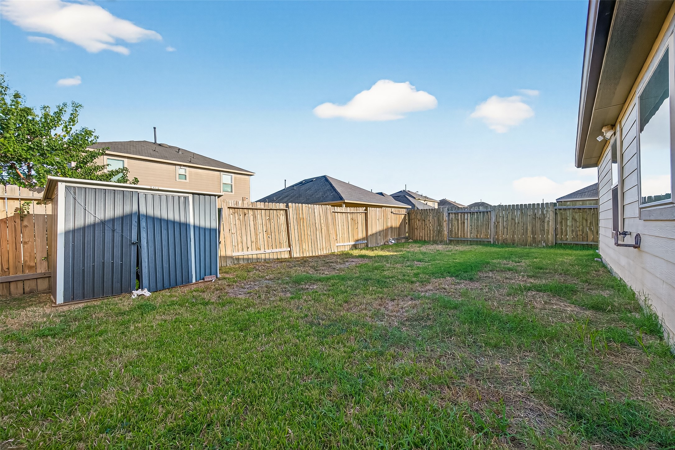 7219 Victorville Drive Rosharon, TX 77583 - Photo 33 of 34 a view of a house with backyard and porch