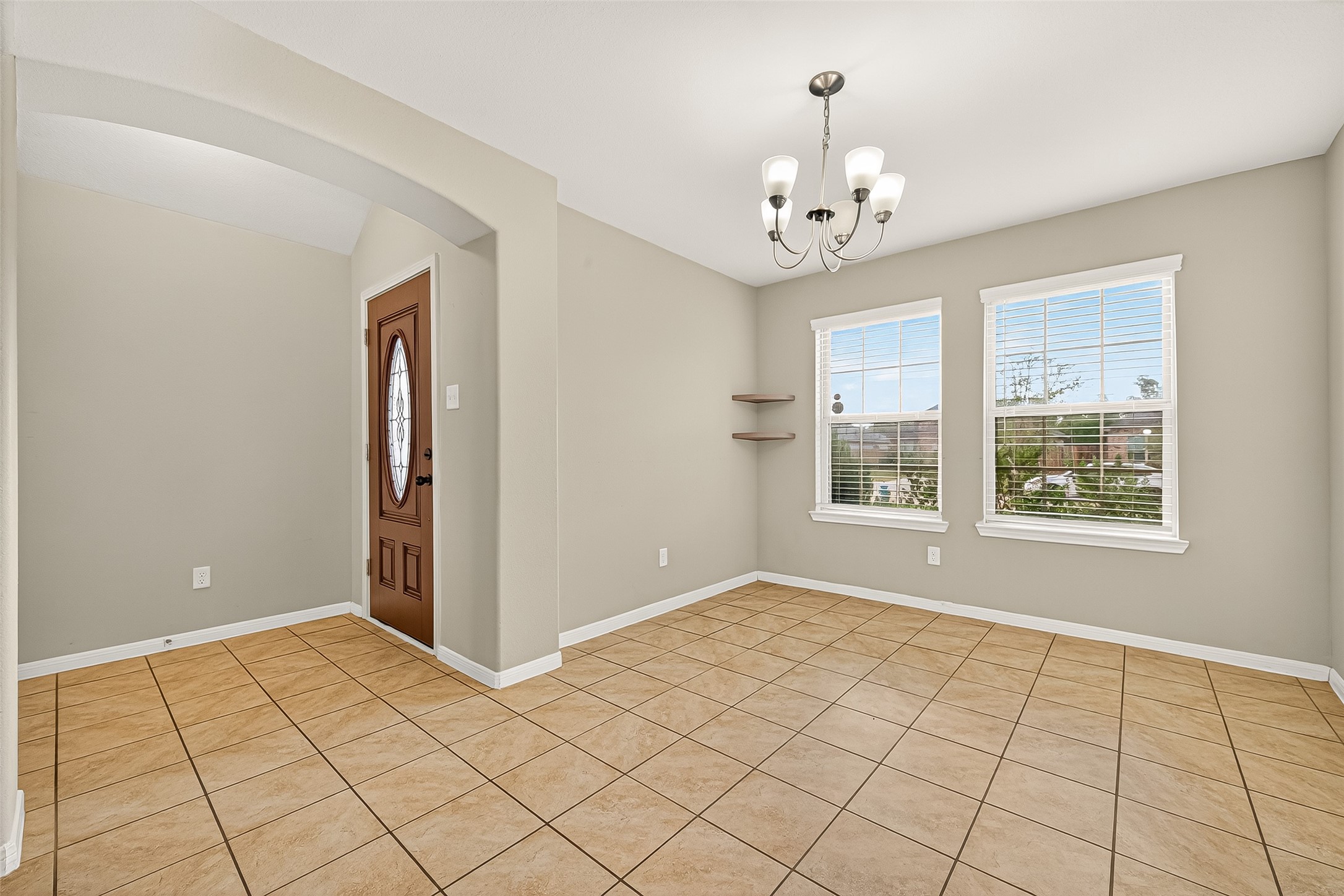 7219 Victorville Drive Rosharon, TX 77583 - Photo 6 of 34 a view of an empty room with window