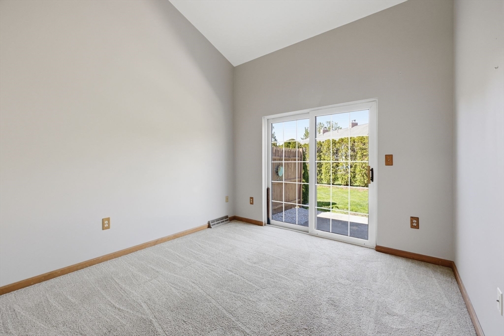 18 Castle Hills Road, Unit G Agawam, MA 01001 - Photo 20 of 39 a view of an empty room with a window