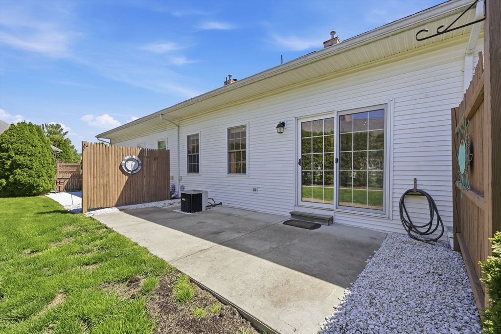 18 Castle Hills Road, Unit G Agawam, MA 01001 - Photo 36 of 39 a front view of a house with patio