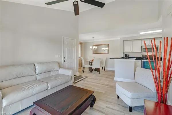 a living room with furniture and a table